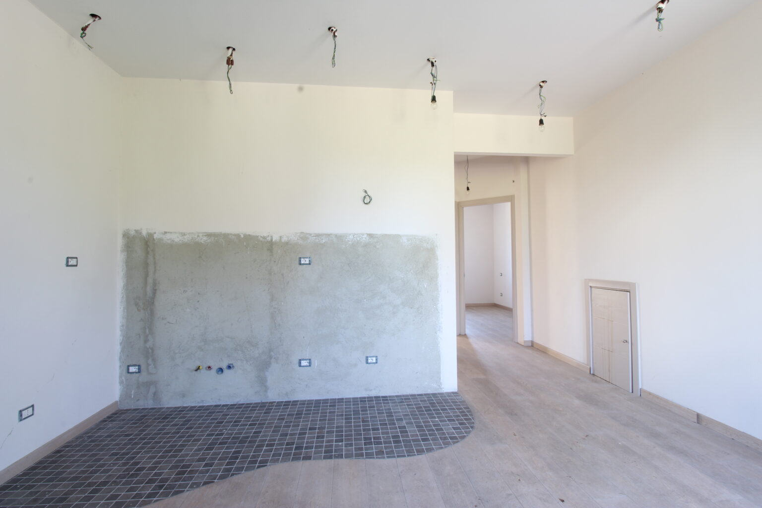 soggiorno con angolo cottura