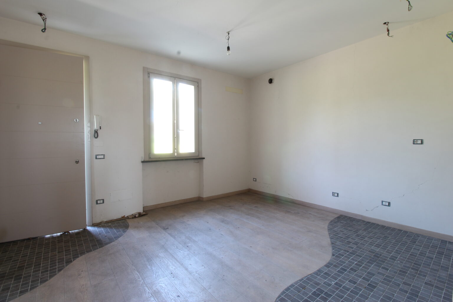 soggiorno con angolo cottura